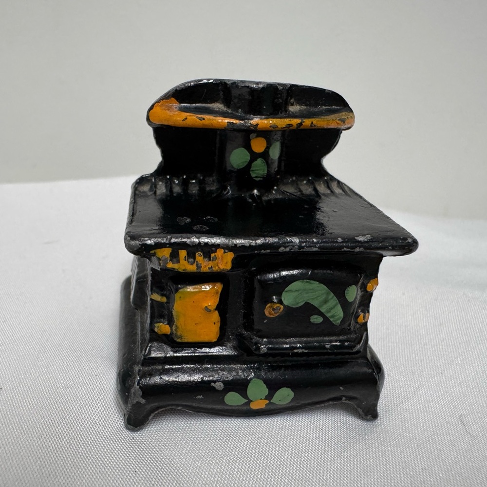 Vintage Hand Painted Cast Iron Stove Small Salt Shaker.